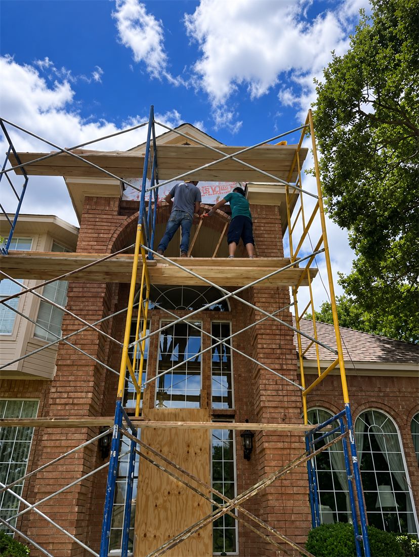 Pfleger Masonry crew at work on a brick facade